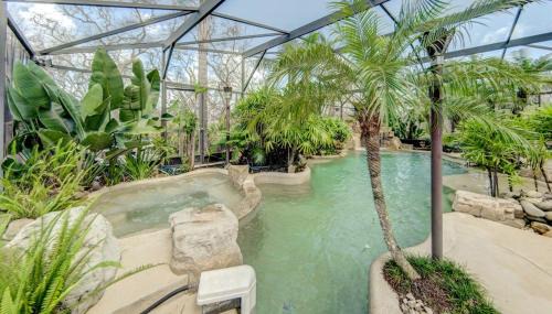 Beach Home with Amazing Oasis Pool Spa Waterfall Fire Pit Bikes