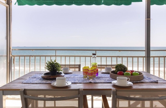 Beachfront Apartment with Terrace, A/C, WiFi & Near PortAventura in La Pineda