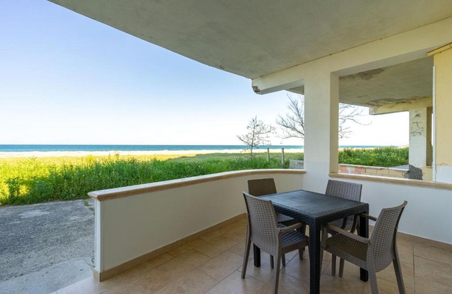 Beachfront apartment with exclusive access