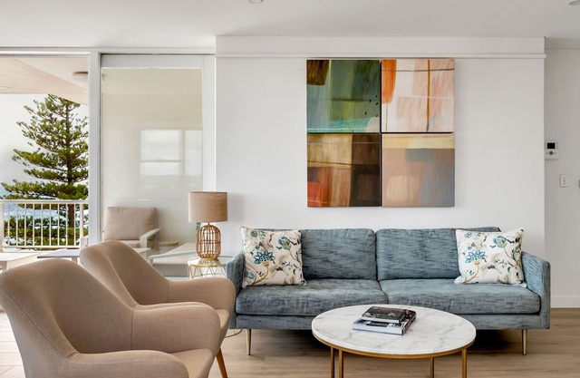 Beachfront Beauty with 270° Views Short Level Walk to Manly