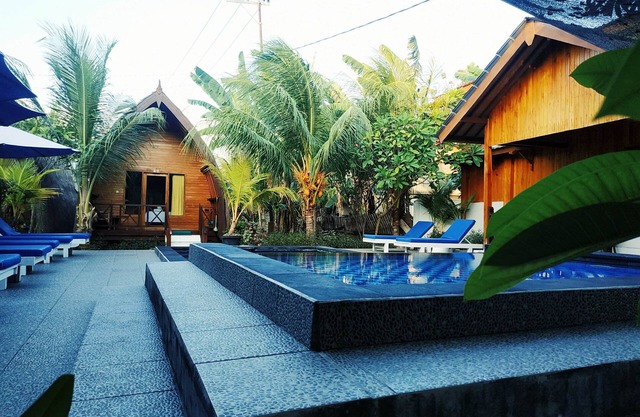 Beachfront Cottages with pool view