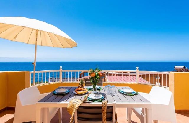 Beachfront triplex with swimming pool & parking