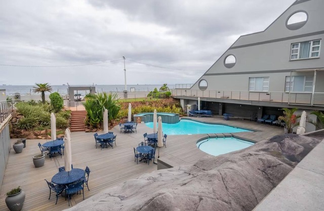 Beachside Bliss | Balcony | Pool | Sea Views