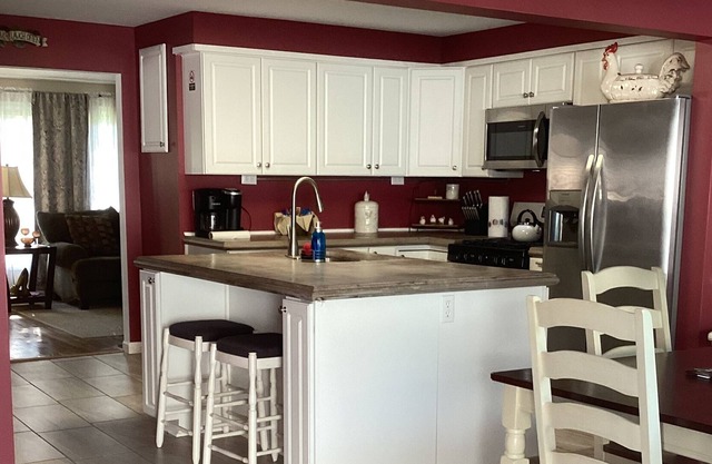 Beautiful 4 bedroom home with large kitchen 1/2 mile to sandy beaches Lake Huron