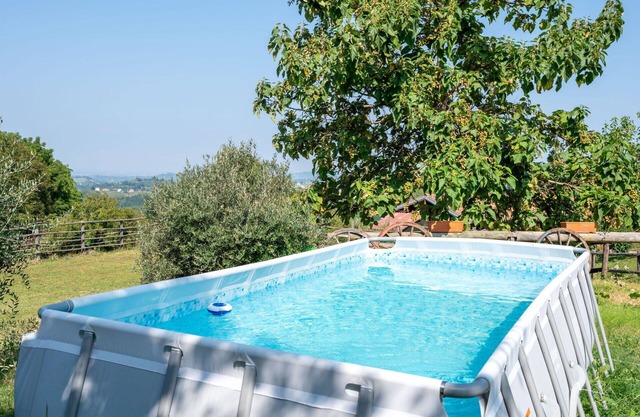Beautiful apartment in villa with WIFI, pool, TV, patio, pets allowed, panoramic view and parking