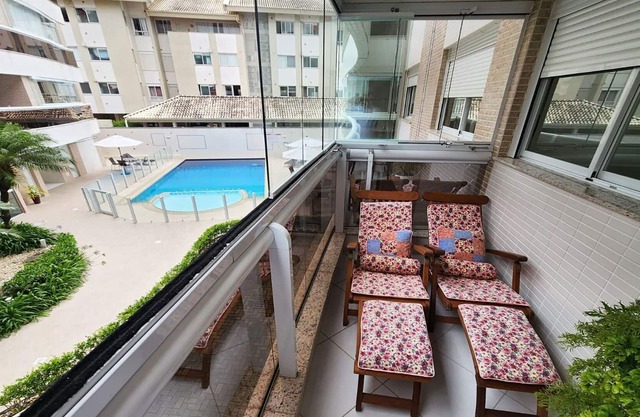 Beautiful balcony overlooking, outdoor pool and barbecue