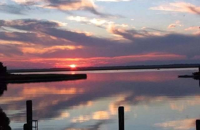 Beautiful Bayfront House w/Boat Dock. Enjoy the Sunsets across Carnival Bay!