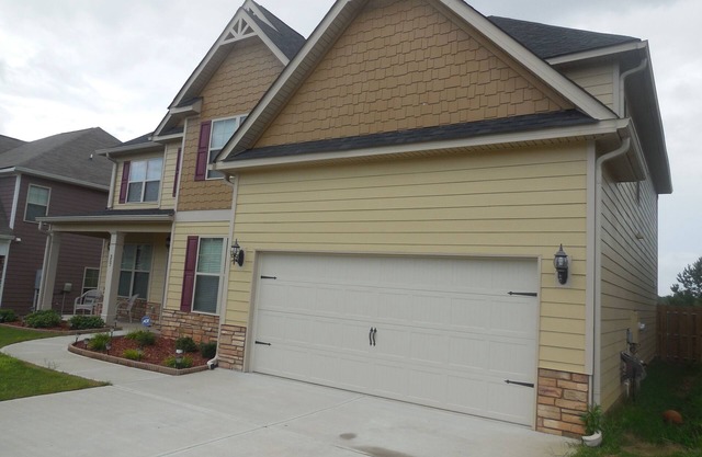 Beautiful, brand new five bedroom house located centrally very close to I20
