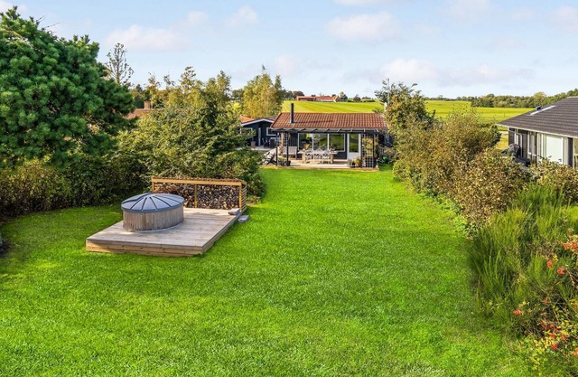 Beautiful cottage in the greenery with sea view, located in a small cottage area.