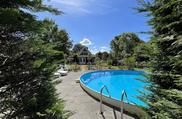 Beautiful detached bungalow with private pool and a large,