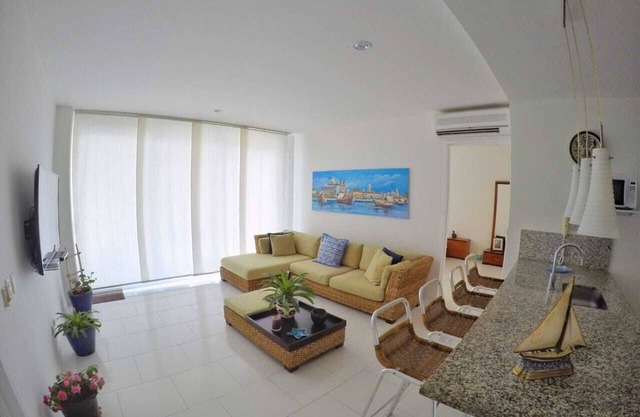Beautiful + fully equipped 2 bedroom apt. Pool +beach view!
