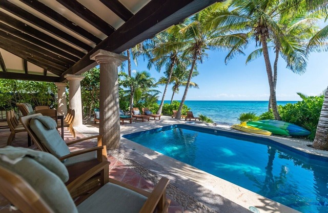 Beautiful Hacienda style villa located on white sandy beach, pool, AC, WiFi!