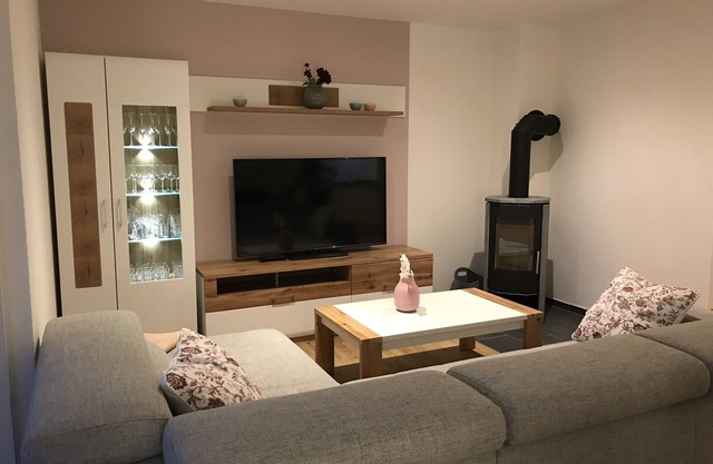 Beautiful holiday apartment with sauna and wood-burning stove on the water and close to the beach