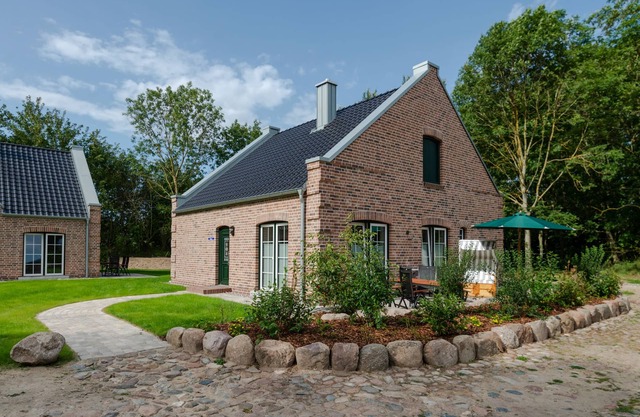 Beautiful holiday home with terrace, beach chair, fireplace and Finnish sauna