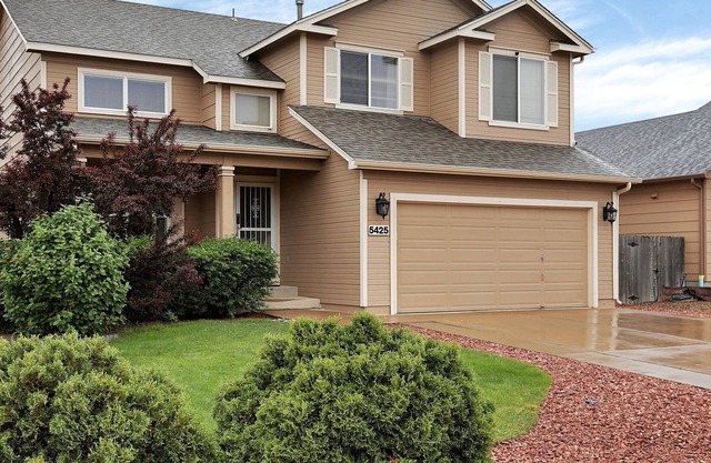 Beautiful Home by C/S Airport, that is great for entertaining inside & outside.
