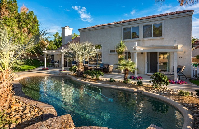 Beautiful home with huge, lush, private backyard and Beach Entry Pool!