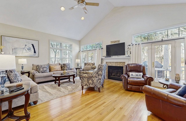Beautiful home with screened porch, deck, W/D, family room, & central AC
