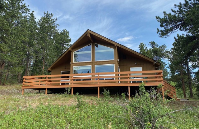 Beautiful house on 10 acres with large deck overlooking private meadow.