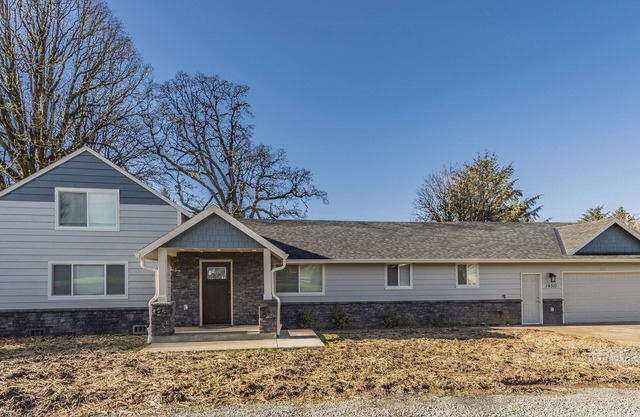 Beautiful like new home with a large hot tub in a quiet neighborhood on Acreage.