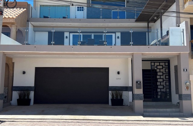 Beautiful modern oceanview home! Just steps away from the beach!