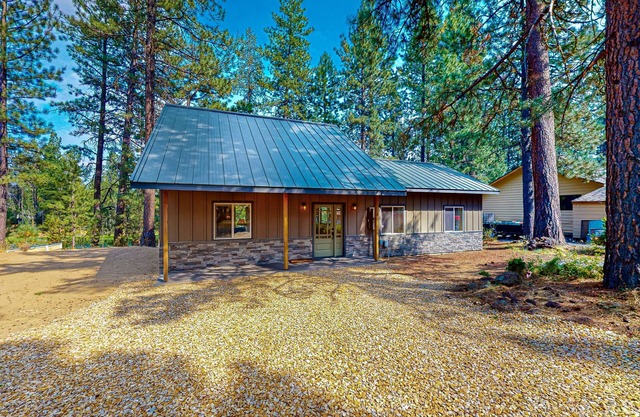 Beautiful riverfront home with private dock, fireplace, WiFi, and patio