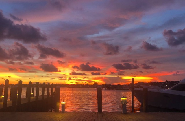 Beautiful sunset waterfront 1st floor marina villa. Quiet safe gated community.