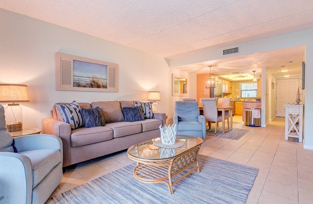 Beautiful beachfront condo with pool, balcony, central AC & washer/dryer