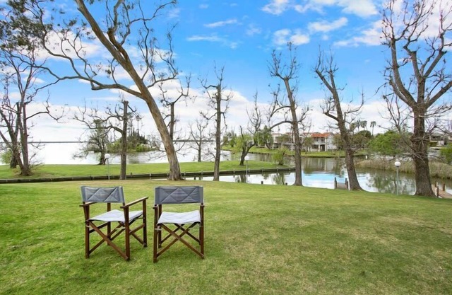 Beautiful waterfront townhouse on Lake Mulwala with a tropical feel.