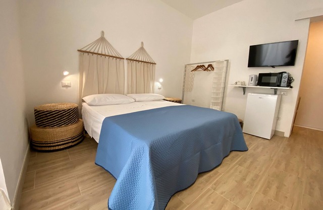 Bed and Breakfast 'Isid'Oro Rooms - Camera 1' with Balcony, Wi-Fi and Air Conditioning