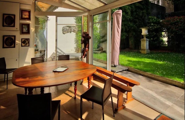 Bedroom and small study on veranda overlooking quiet garden