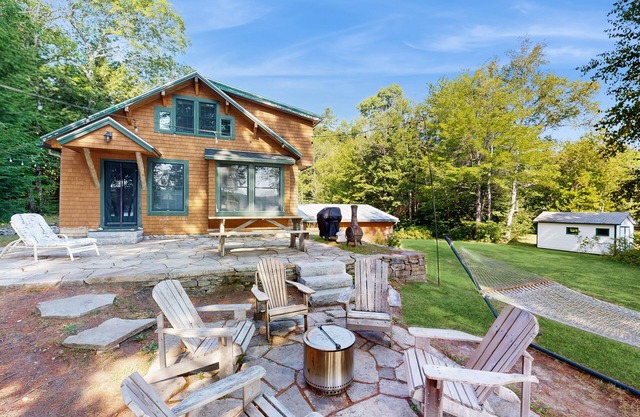 Belgrade Lakes getaway with private swim dock, outdoor living, & canoe/kayaks