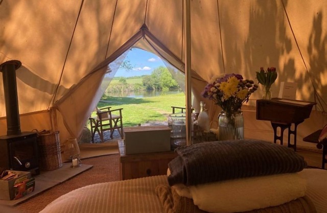 Bell tent in ultimate luxury with a wood fired hot tub, super king size bed