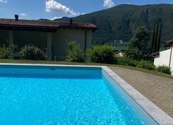 Bellissimo appartamento con giardino sul lago di Lugano