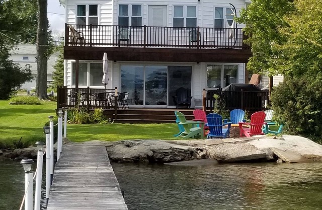Bemus Point lakefront family home with deck, dock, boat slip, sunroom with view