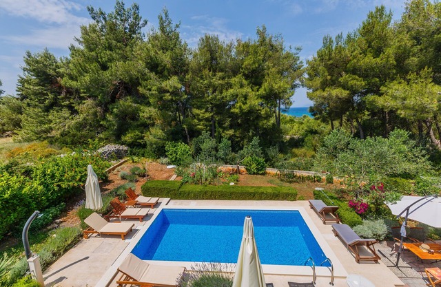 Big family villa with pool, quiet & green location, just 2 minutes walk to beach