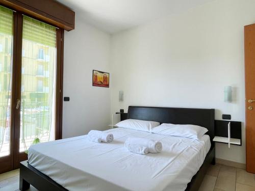 Bilocale con terrazzo e parcheggio – Alba Blu
