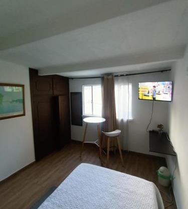 bonita y cómoda habitación