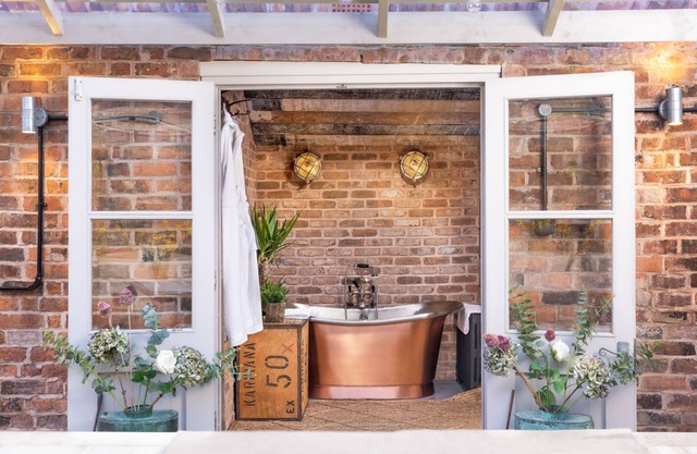 Boutique, three storey Georgian Town House, ground floor apartment with garden