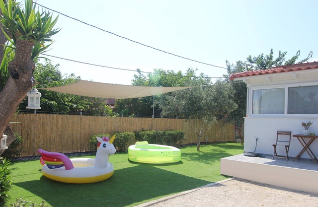 Brand new house with garden, next to the beach.