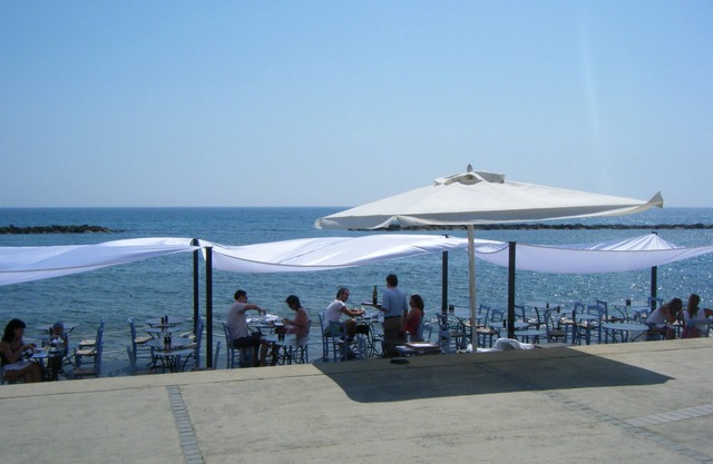 Breakfast on the terrace next to the gorgeous pool, walkable to sandy beaches