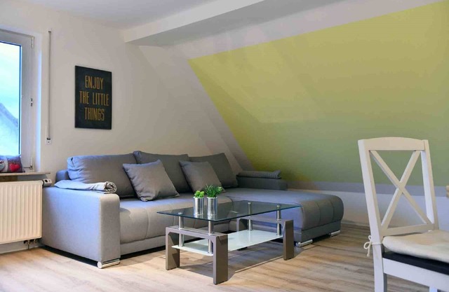 Bright and friendly furnished apartment (73 sqm) for up to three people with roof terrace