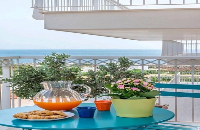 Bright Dwelling with sea view, partnered with private beach and pool/spa.