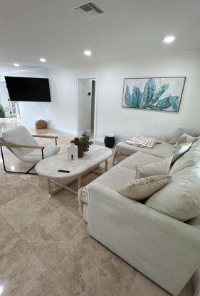 Bright Fort Lauderdale Villa with Private Heated Pool, Modern Décor and Palm-Lined Outdoor Oasis
