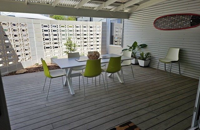 Bright happy home suitable for two couples or upgrade to five guests.n