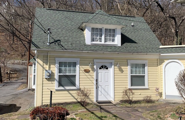 Brookside Cottage is a beautiful open concept doll house stay for two.