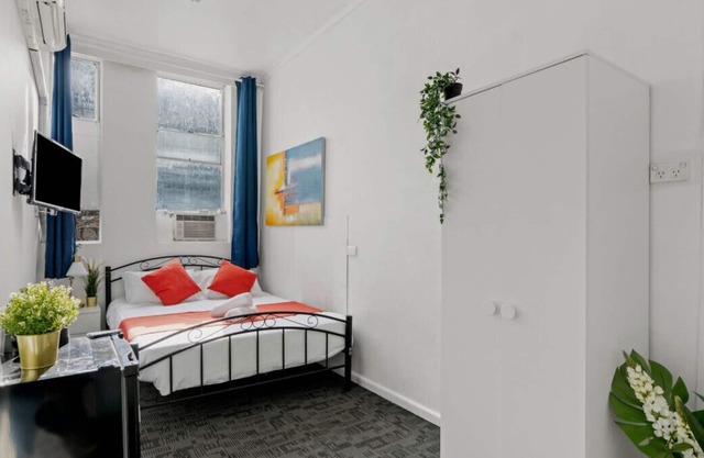 Budget double room in a hotel shared bathroom wifi