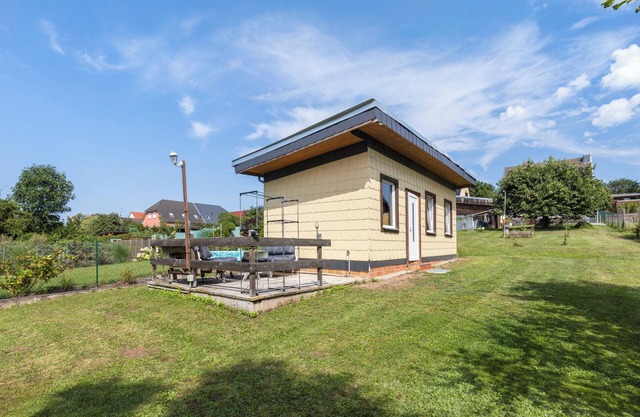 Bungalow 'Ferienhaus Sonne' with Private Terrace, Shared Garden and Wi-Fi