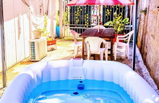 Bungalow Sixdays 2 with outdoor hot tub.