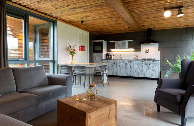 Bungalow with decorative fireplace, on farm