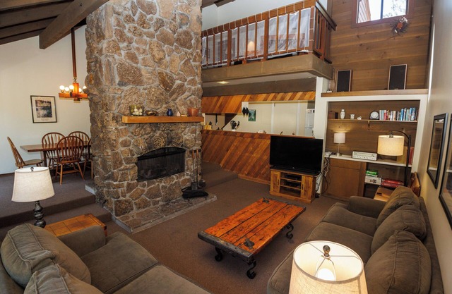 Cabin Feel, A Cozy Stone-Faced, double sided Fireplace! - Landrise 7